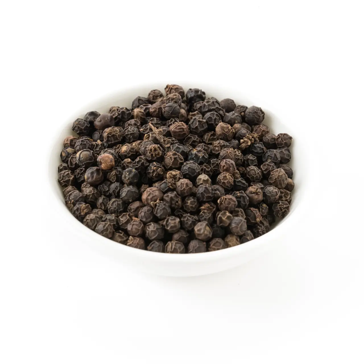 black peppers on white background